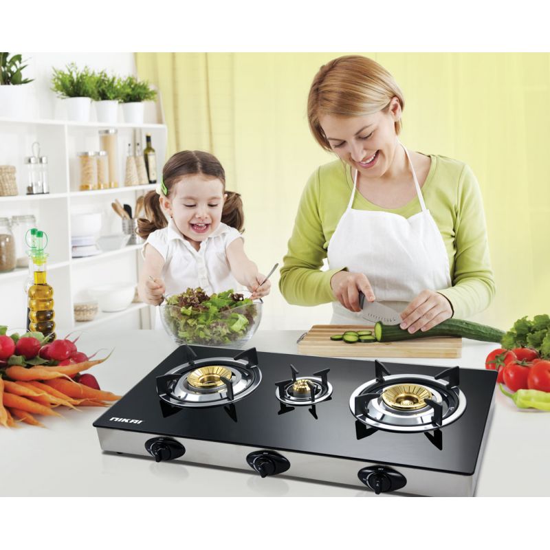 Nikai Gas Cooker 3 Burner Glass Triple Gas Burner 3 Burner Glass Top 7 MM Tempered Glass Panel Auto Ignition System Whirlwind Flame Brass Burner Cap NG333G